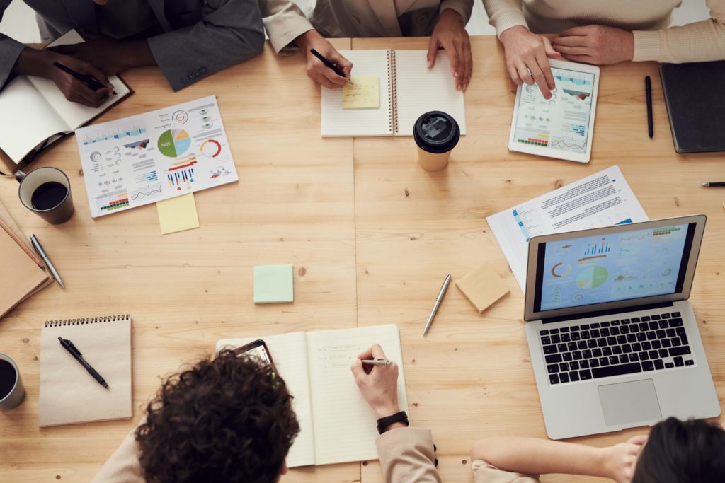 business people discussing key person insurance