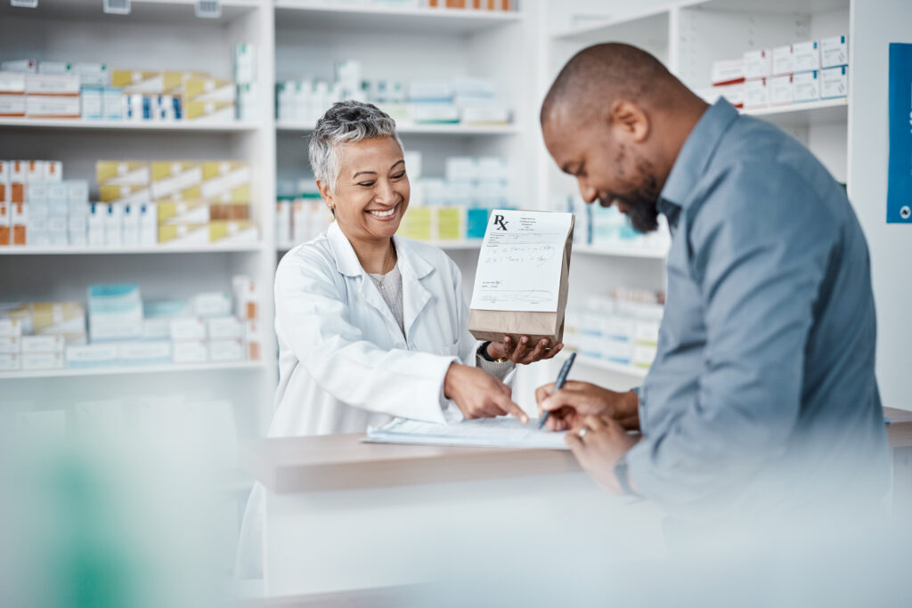 Pharmacy clients discussing National Pharmacare program