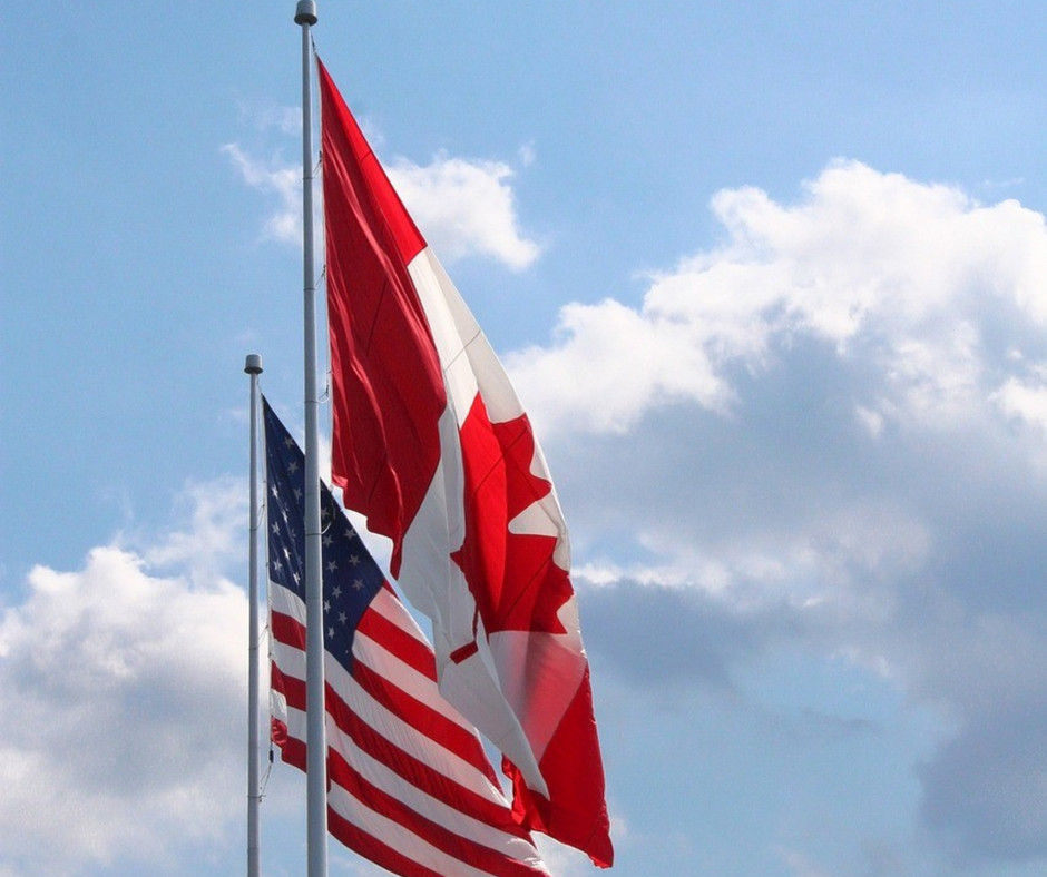 Flags symbolizing Canada-US trade and tariffs